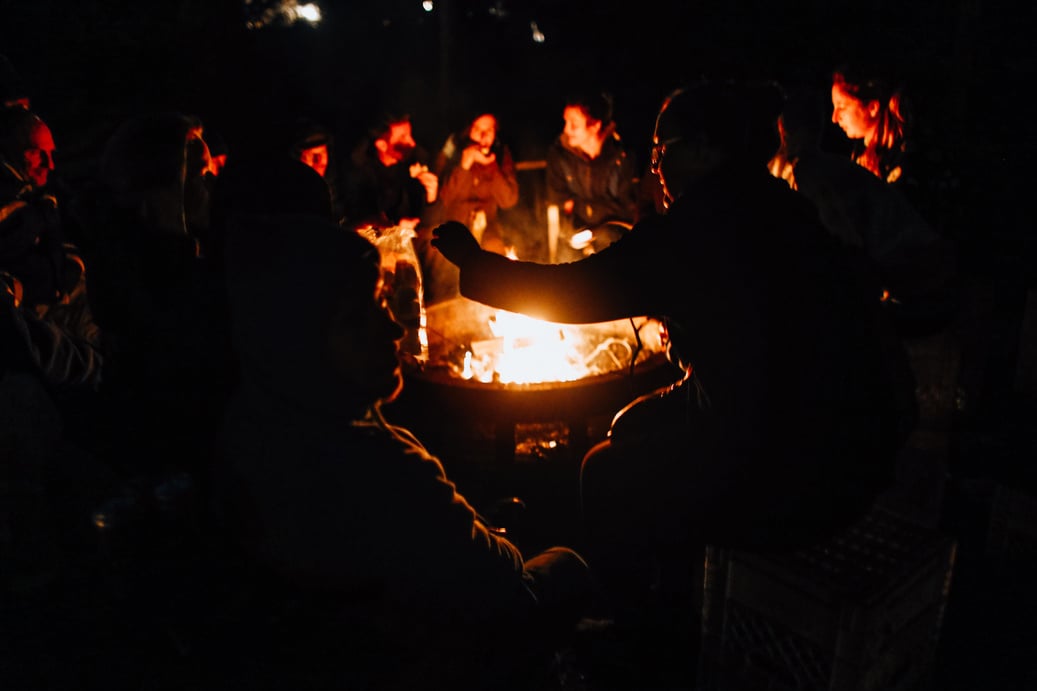 People Gathered Around the Fire Pit